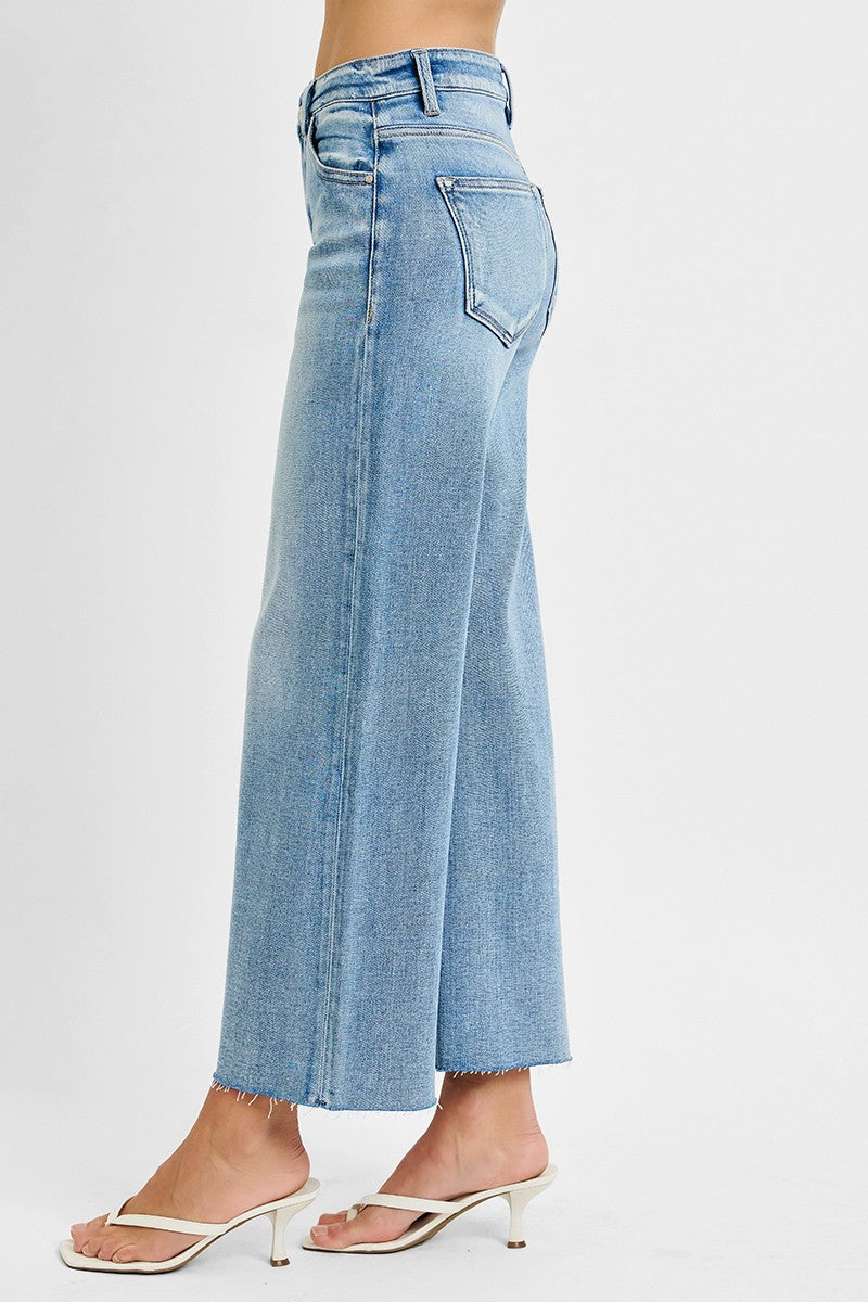 Risen Mid Rise Raw Cut Hem Jeans