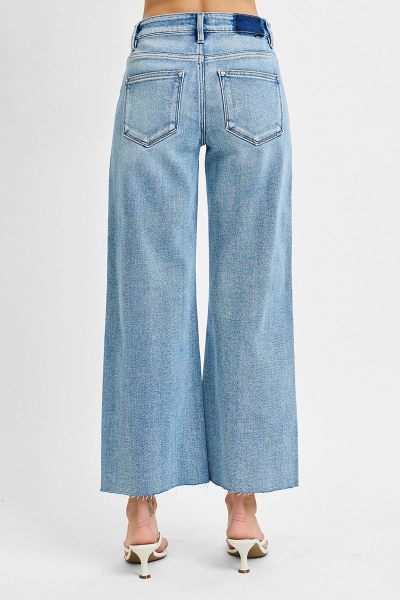Risen Mid Rise Raw Cut Hem Jeans